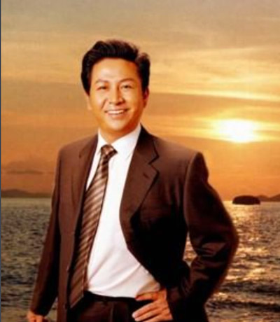 何茂春.jpg